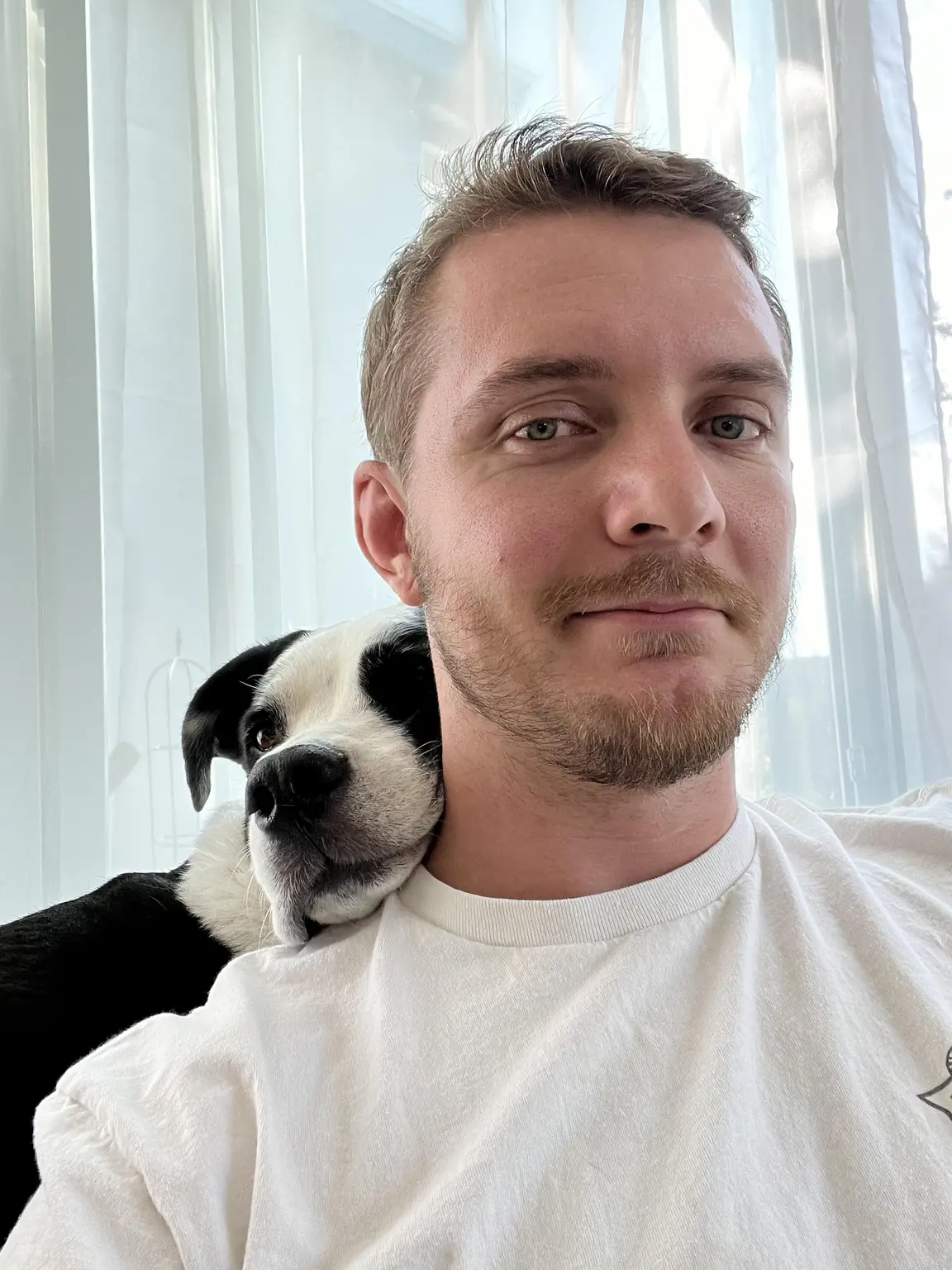 Chase, founder of Sitter Unleashed, with his dog